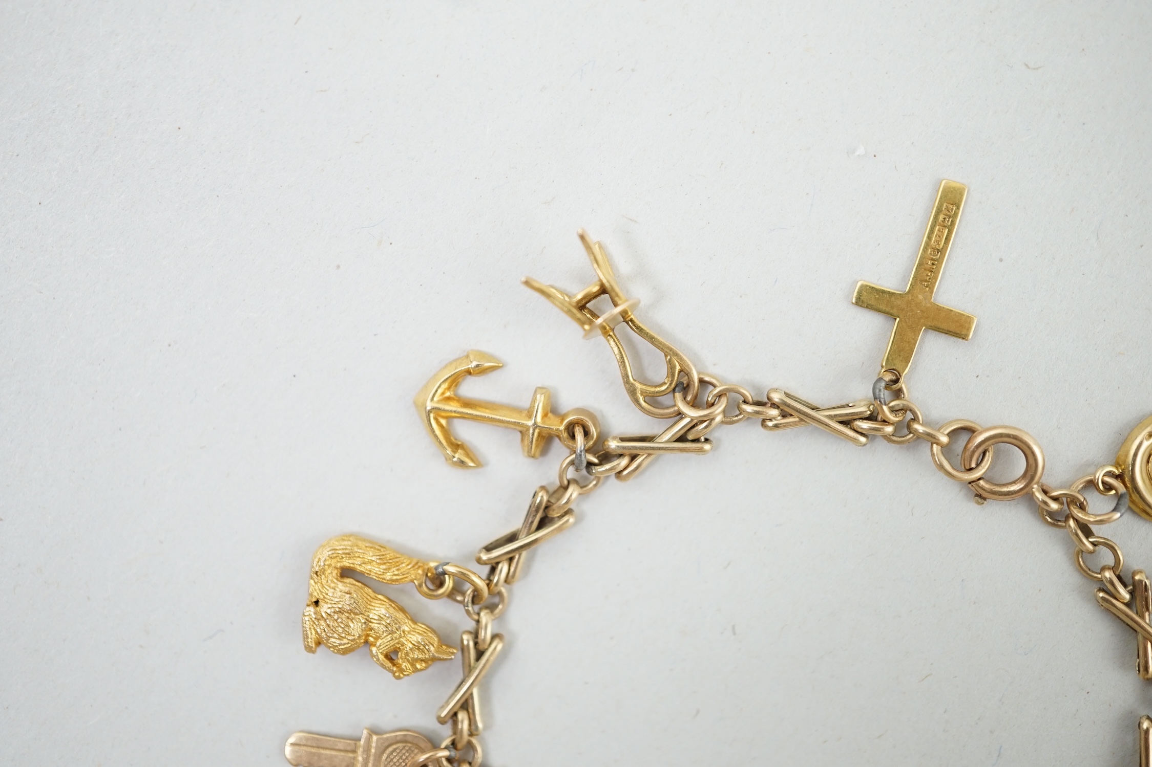 A 9ct gold charm bracelet